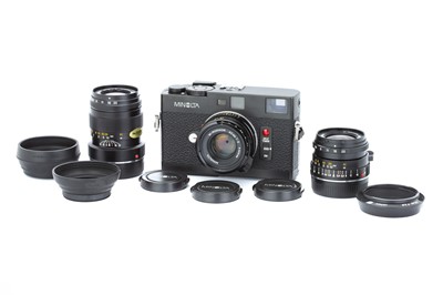 Lot 58 - A Minolta CLE Rangefinder Outfit