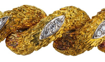 Lot 13 - An 18 carat yellow gold and diamond bracelet