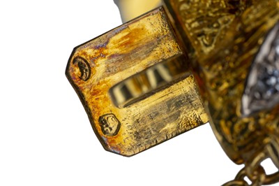 Lot 13 - An 18 carat yellow gold and diamond bracelet