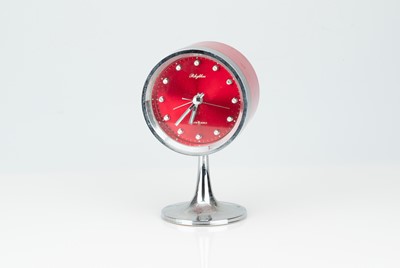 Lot 15 - A 1970s Retro Rhythm Drum-Shaped Two Jewel Alarm Clock