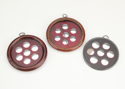 Lot 168 - Three Small Sorcerer's Mirrors