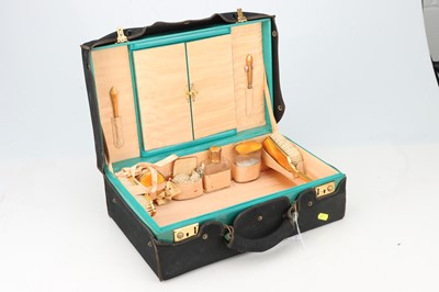 Lot 32 - A Mid-Twentieth Century Teal Leather Vanity Case