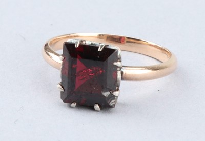 Lot 141 - A Pincess Cut Ruby Solitaire Ring