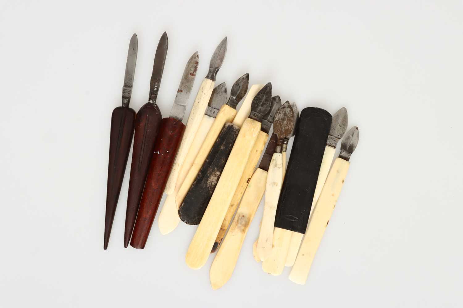 Lot 41 - 12 Ivory and Bone Handled Erasers
