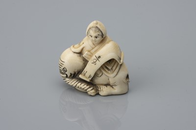 Lot 74 - A Meiji Period Ivory Netsuke of Karako on a Resting Elephant