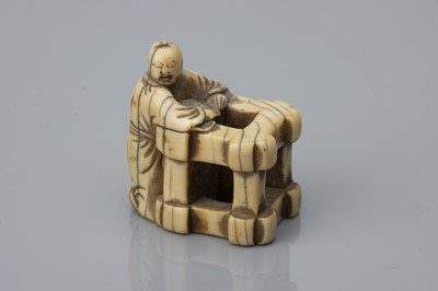 Lot 76 - An Edo Period Ivory Netsuke as a Karako with Box Crate