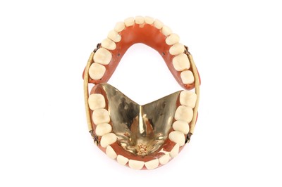Lot 21 - A Complete Set of Sprung Dentures in Gold & Porcelain