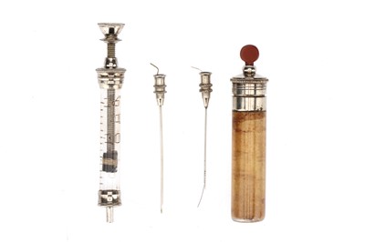 Lot 133 - A Decorative Opiate Syringe Set