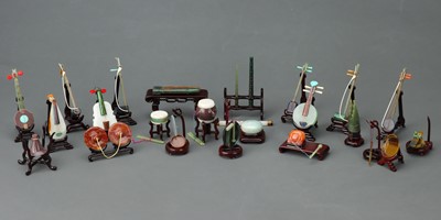 Lot 88 - A Boxed Set of 20 Mid-Twentieth Century Chinese Jade Carved Musical Instruments
