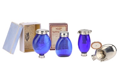 Lot 54 - A Collection of Pocket Spitting Flasks and Spittoons