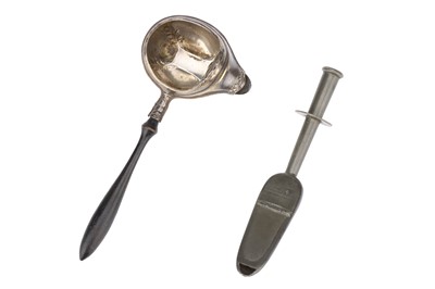 Lot 49 - A Pewter Gibson Spoon and A silver Plated feeding Spoon