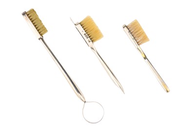 Lot 27 - Dental Antiques, Silver Toothbrushes and Tongue Scraper