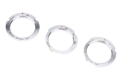 Lot 40 - Three Leica M to Screw Adapters