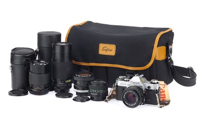 Lot 197 - A Canon AE-1 35mm SLR Camera Outfit