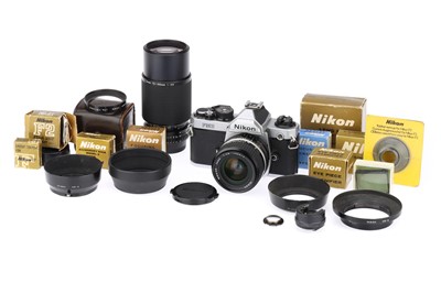 Lot 67 - A Nikon FM2n SLR Camera Outfit