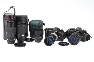 Lot 84 - Two Nikon F-301 SLR Cameras with Lenses