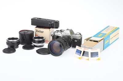 Lot 169 - A Canon AL-1 QF 35mm SLR Camera with an FD Zoom Lens