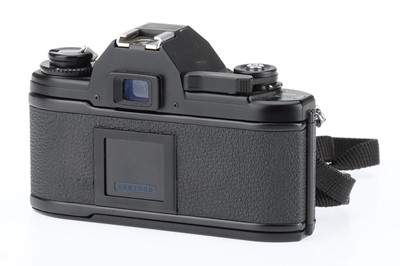Lot 60 - A Nikon EM 35mm SLR Camera