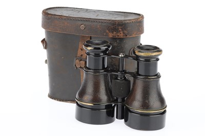 Lot 646 - A Small Pair of Binoculars