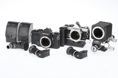 Lot 144 - An Olympus OM-2n and a Nikon Nikkormat FT2 SLR Bodies