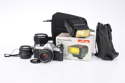 Lot 197 - A Pentax MX 35mm SLR Camera and Lenses