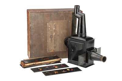 Lot 570 - Tinplate Magic Lantern In Original Case
