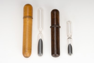 Lot 90 - 2 Sandglasses In Wooden Containers