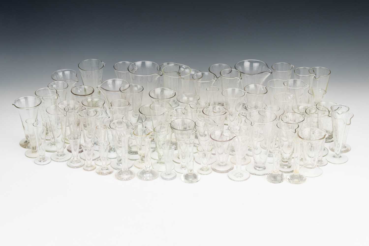 Lot 48 - A Very Large Collection of Medicine Measures