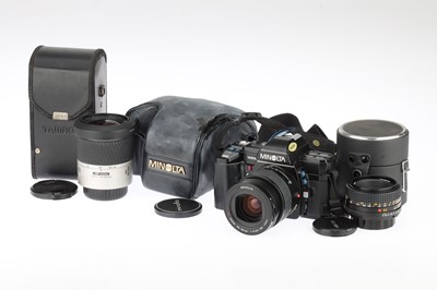 Lot 378 - A Minolta 7000 AF 35mm SLR Camera with Lenses