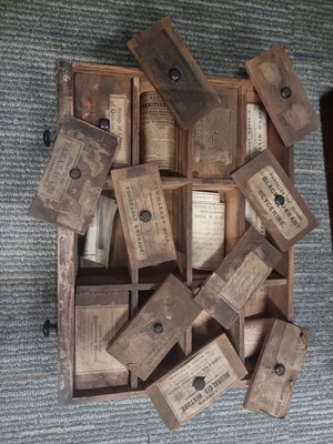 Lot 61 - An Apothecaries Cabinet of Bottle Labels