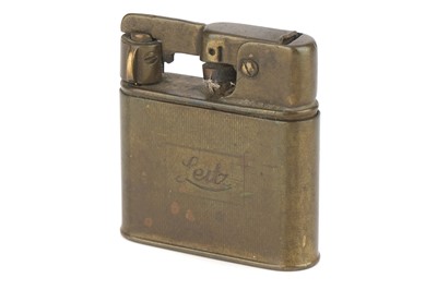 Lot 103 - A Brass Cigarette Lighter