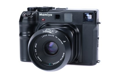 Lot 218 - A Mamiya 6 MF Medium Format Rangefinder Camera Outfit