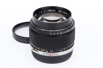 Lot 358 - an Olympus Zuiko Auto-T f/2 85mm Lens