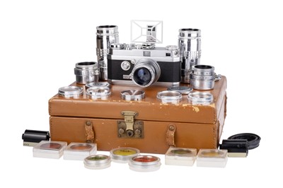Lot 119 - An OPL Foca Universel R Rangefinder Camera Outfit