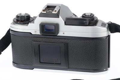 Lot 26 - A Nikon FG-20 35mm SLR Camera Outfit