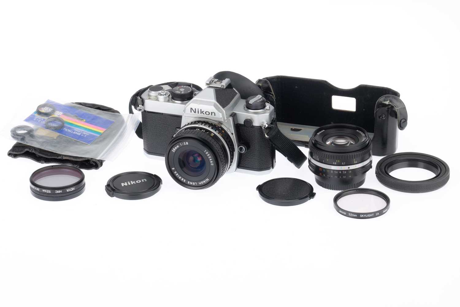 Lot 27 - A Nikon FM 35mm SLR Camera Outfit