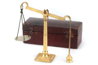 Lot 707 - A gilt brass Olmsted Patent Stove Company Pocket Sovereign Scale