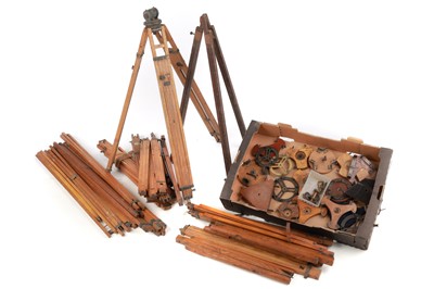 Lot 543 - A Collection of Wooden Tripod Legs and Tops