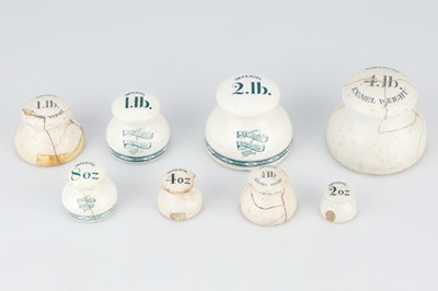 Lot 691 - A group of white ceramic lead-weighted Imperial Grocers' Weights