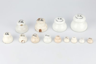 Lot 692 - A group of white ceramic lead-weighted Imperial Grocers' Weights
