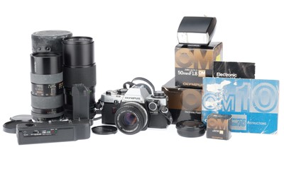 Lot 298 - An Olympus OM-10 35mm Camera Outfit