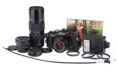 Lot 169 - A Canon AE-1 Program 35mm Camera Outfit