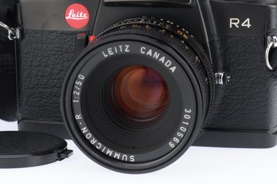 Lot 43 - A Leica R4 SLR Camera Outfit