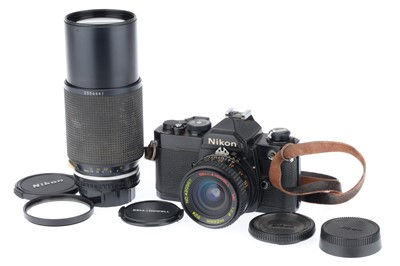 Lot 72 - A Nikon FM 35mm Camera Outfit