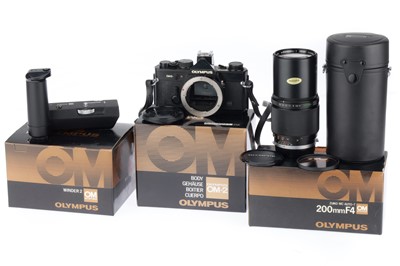 Lot 442 - An Olympus OM-2N MD Camera Outfit