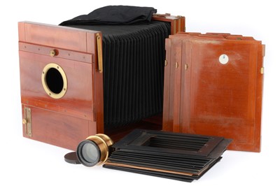 Lot 511 - A Mahogany and Brass 24x18cm Tailboard Camera