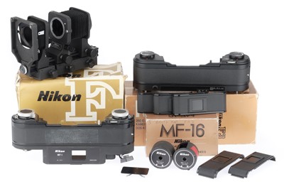 Lot 418 - A Selection of Nikon Large Capacity 35mm Film Accessories