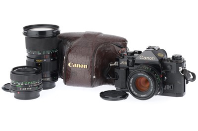 Lot 214 - A Canon A-1 35mm SLR Camera Outfit
