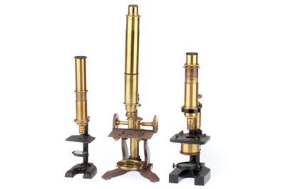 Lot 615 - A Collection of 3 Small Brass Microscopes