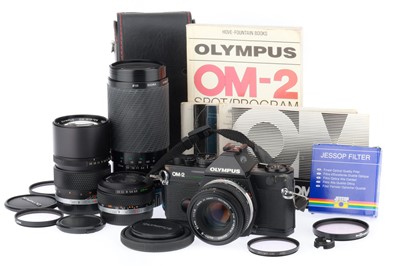 Lot 220 - An Olympus OM-2 Spot/Program SLR Camera Outfit